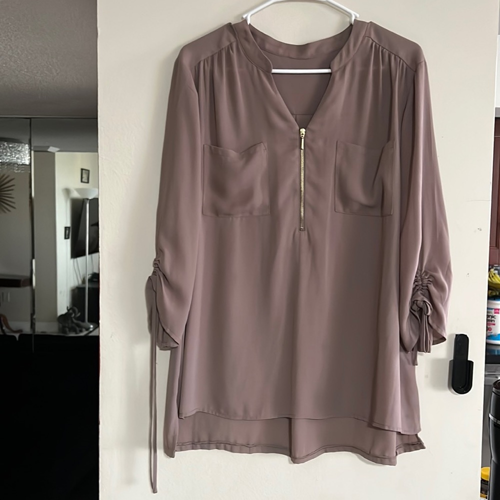 26.The Danielle Elegant V-Neck Zip-Up Blouse